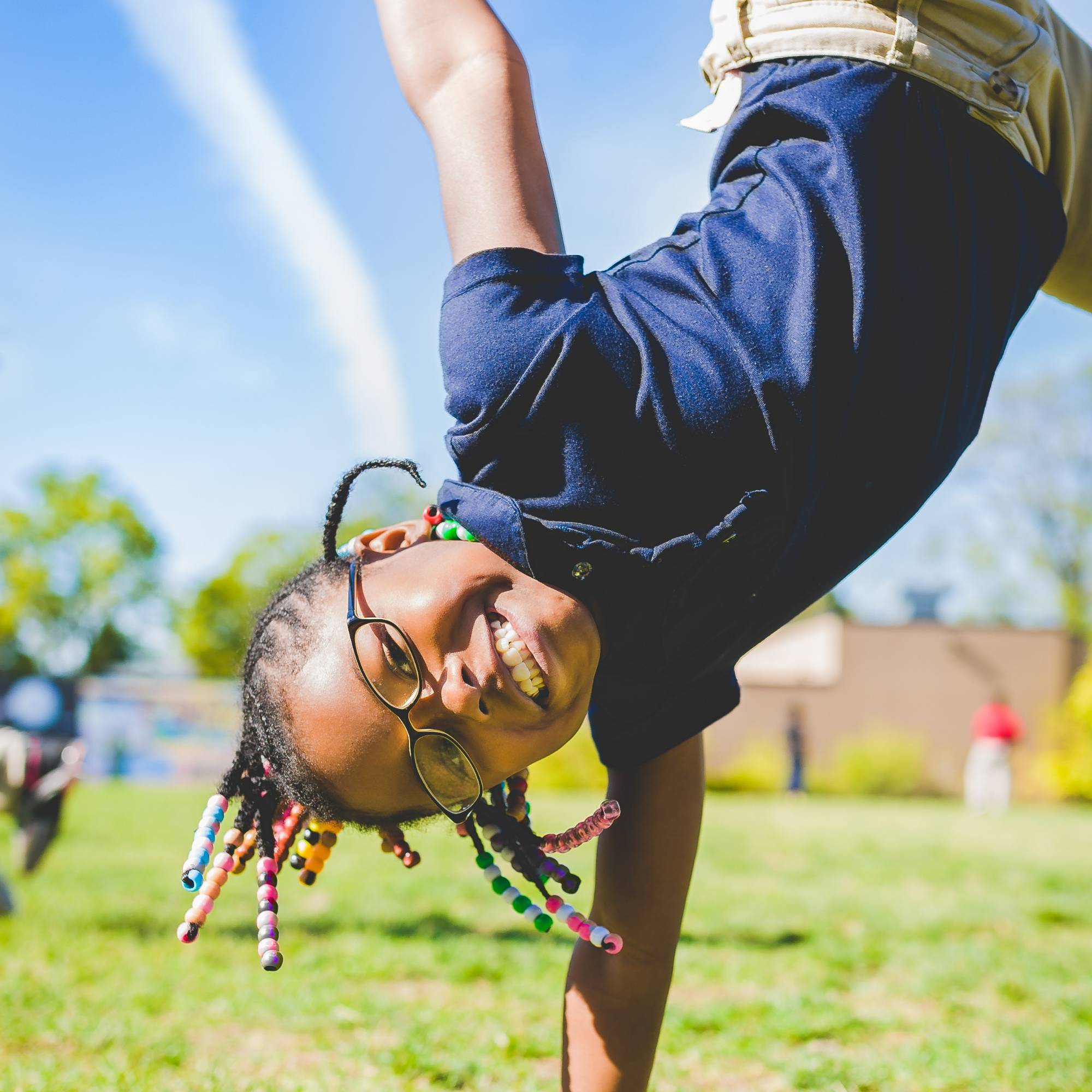 girl doing a cartwheel